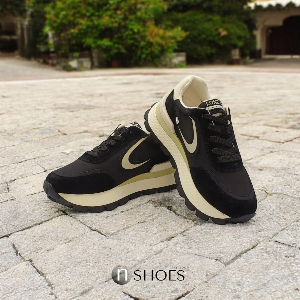 Жіночі шкіряні чорні кросівки Lonza модель 5636