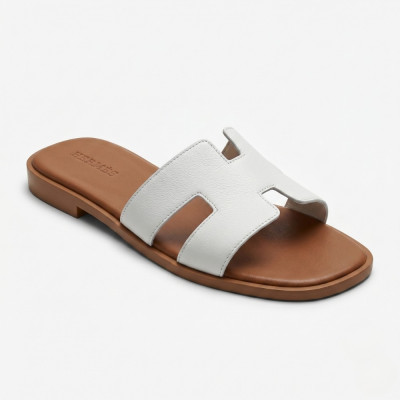 Women's flat slippers HERMES 212827 Lonza 212609 94404304-1 l 6270 white made of genuine leather in the style of the iconic and timeless Hermès Canada Oran sandal model