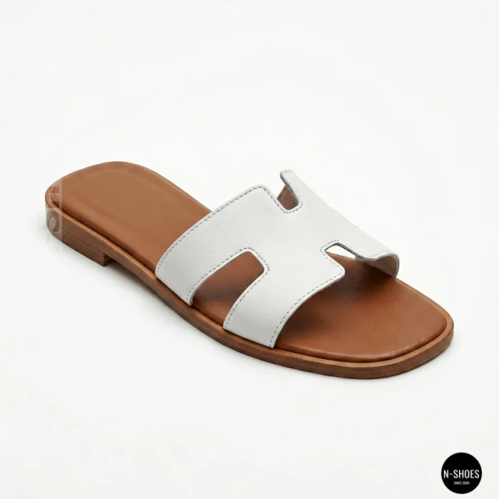 Білі шкіряні шльопанці HERMES Oran 212827 Lonza 212609 94404304-1 l 6270 в стилі тихої розкоші