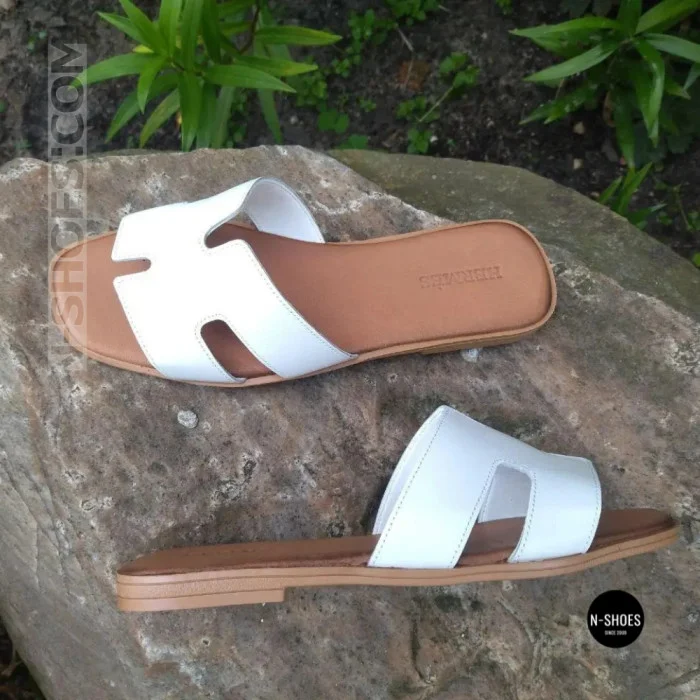 Білі шкіряні шльопанці HERMES Oran 212827 Lonza 212609 94404304-1 l 6270 в стилі тихої розкоші