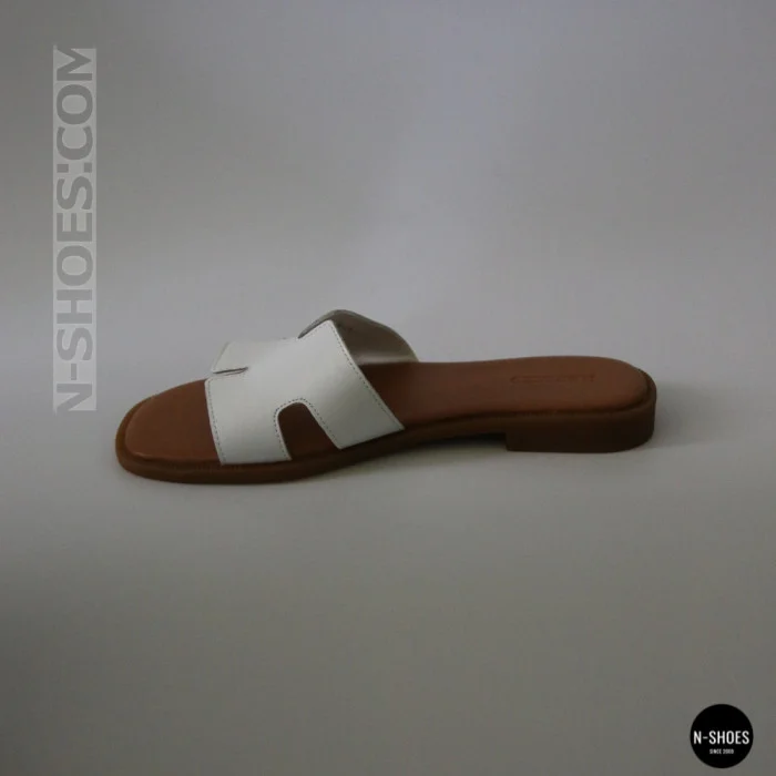 Білі шкіряні шльопанці HERMES Oran 212827 Lonza 212609 94404304-1 l 6270 в стилі тихої розкоші
